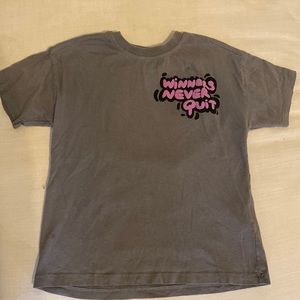 Winners never quit graphic tee